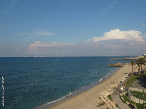 Beautiful view of the Mediterranean Sea and the Bat Galim promenade in winter in Haifa, Israel. The photo can be used as a banner for advertising. There is room for text. photo