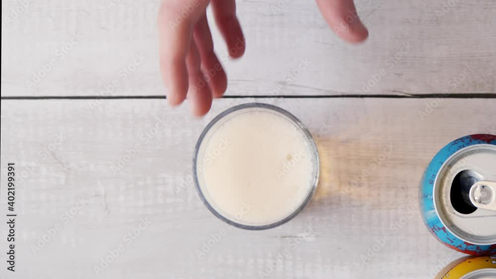 Top View Hand Picking Up Glass of Beer Top View Hand Picking Up Glass of Beer