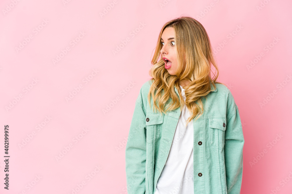 Young caucasian blonde woman being shocked because of something Young caucasian blonde woman being shocked because of something
