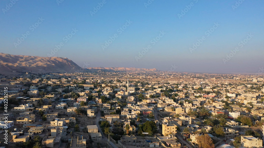 Aerial view over Jericho City in desert Sunset
Drone view of Jericho city, Jordan Valley, Israel/palestine
