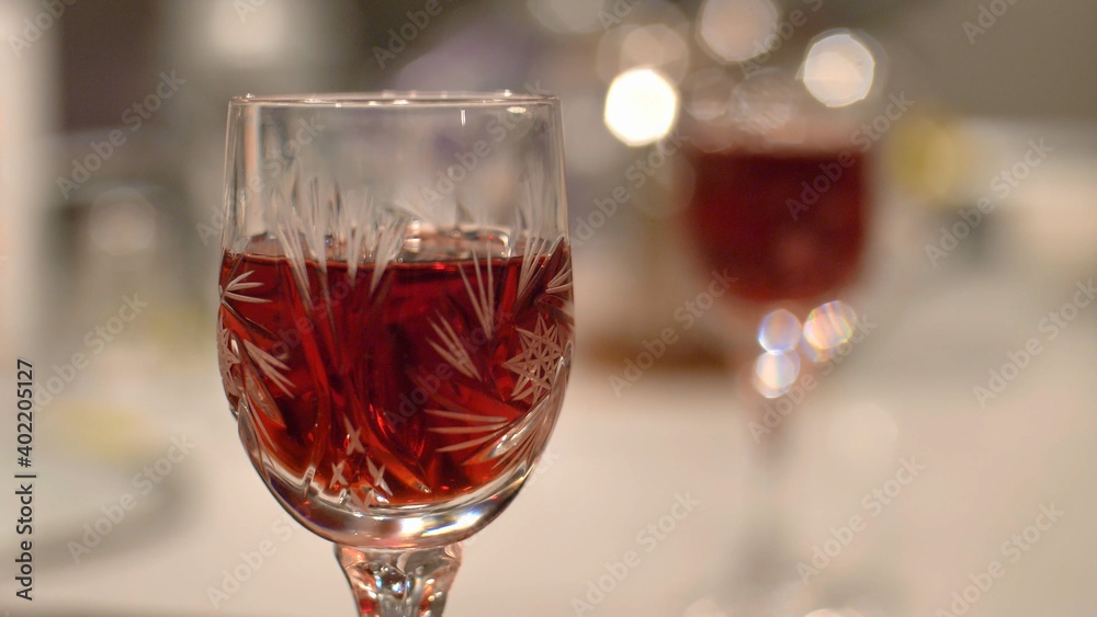 Pouring Red Alcohol Liquor Into Shot-Glass Close-Up