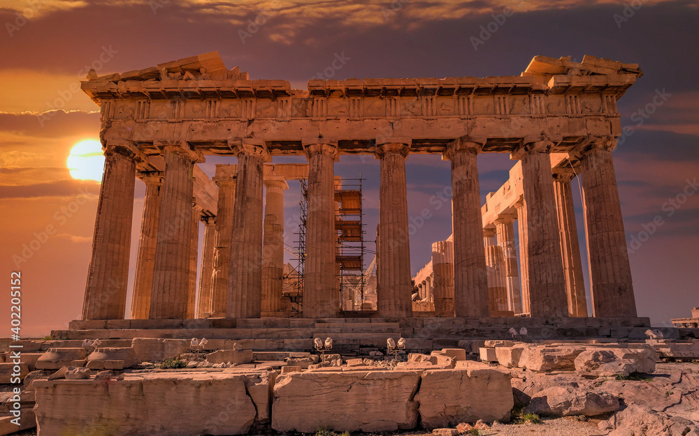 Fototapeta premium Parthenon temple east front illuminated by dramatic, fiery sunny sky, Athens Greece