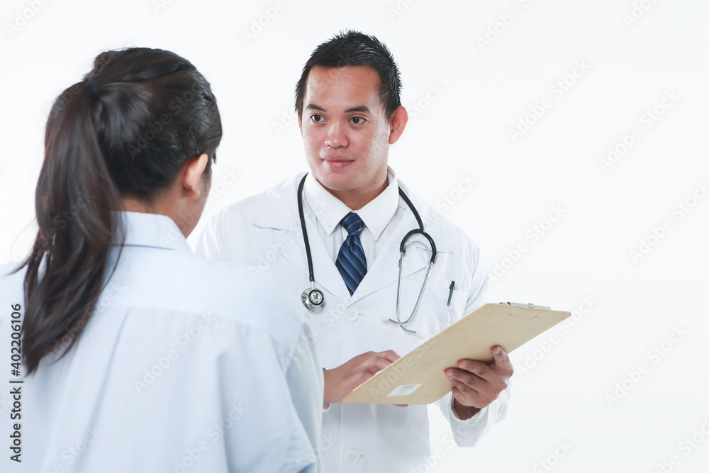 Doctors reviewing and discussing the results Doctors reviewing and discussing the results