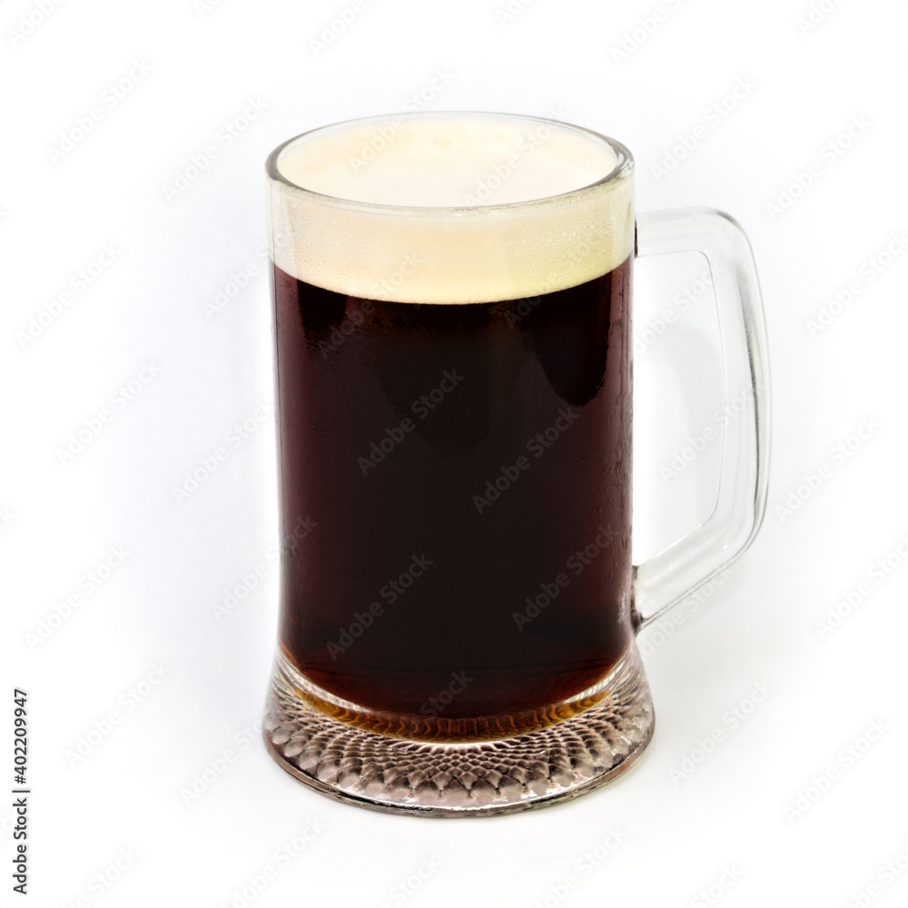 Mug of dark beer with foam Mug of dark beer with foam