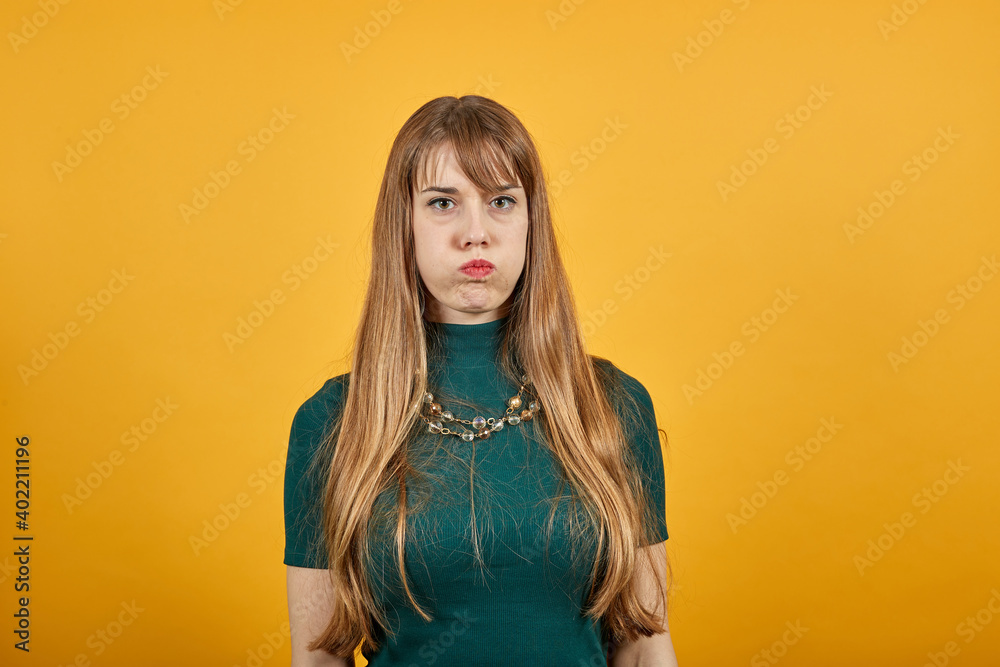 Upset offended looking big eyes, blowing cheeks being annoyed after quarrel with her husband, inflating not wanting to do something, bad mood, fascinating, cut, pouted Upset offended looking big eyes, blowing cheeks being annoyed after quarrel with her husband, inflating not wanting to do something, bad mood, fascinating, cut, pouted