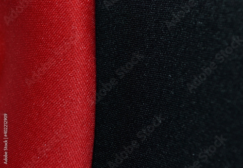 close-up view of red and black neoprene fabrics