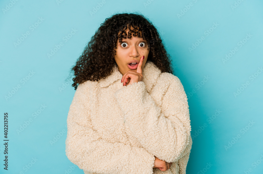 Young african american afro woman isolated having some great idea, concept of creativity. Young african american afro woman isolated having some great idea, concept of creativity.