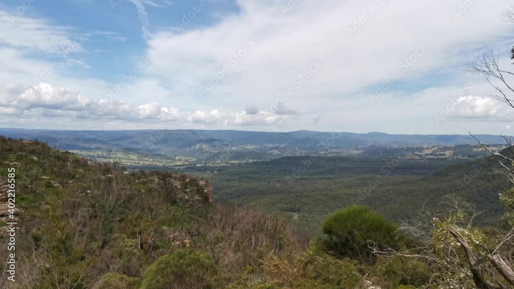 Beautiful lookout of mountain peaks, deep valleys, trees and blue sky with light clouds Blue Mountain National park, Blue Mountain, New South Wales, Australia
Beautiful lookout of mountain peaks, deep valleys, trees and blue sky with light clouds Blue Mountain National park, Blue Mountain, New South Wales, Australia