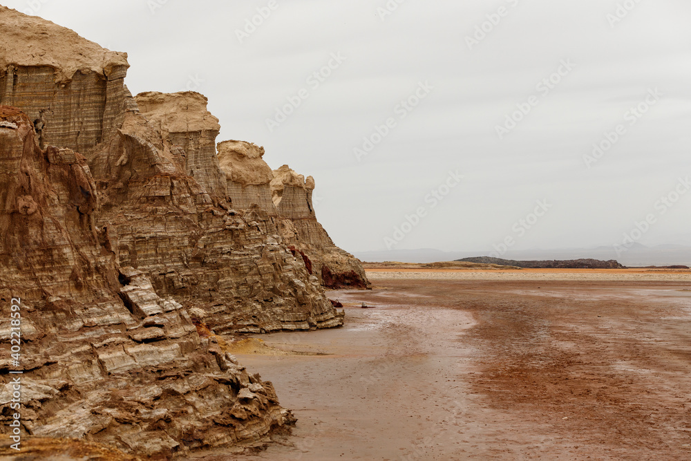 salt lake with large sand.salt rocks along the shores