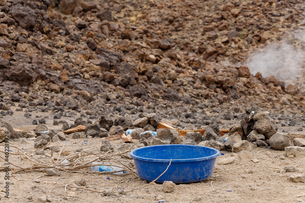 in the desert tossed in the sand a lot of plastic bottles and other waste in the desert tossed in the sand a lot of plastic bottles and other waste