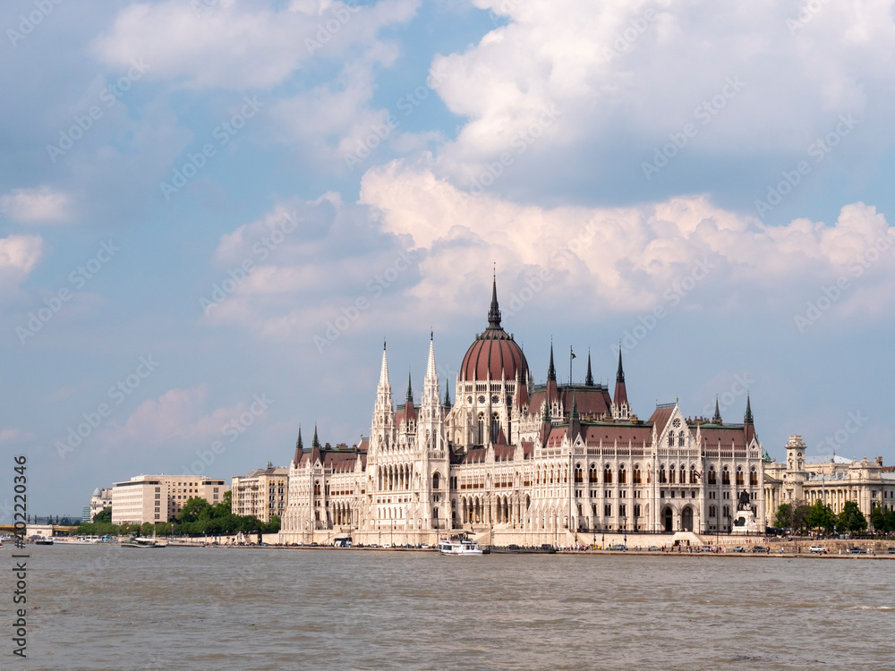 daytime wide shot of the hungarian parliament and river danube in budapest