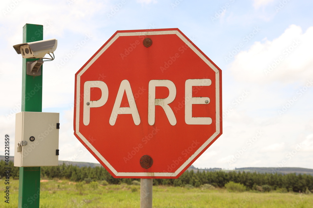 Obraz premium Stop Sign/Placa de Pare