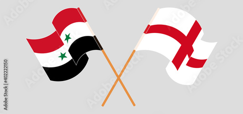Crossed and waving flags of Syria and England