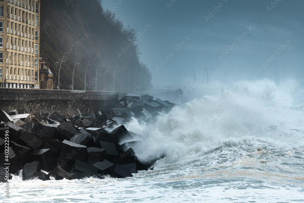 Fototapeta premium Waves breaking on the New Promenade of Donostia/San Sebastian, Spain
