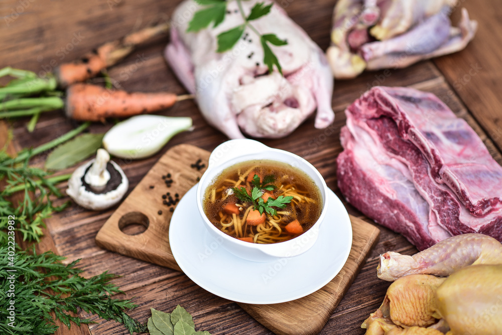 Slow-boiled broth based on several types of meat and aromatic ...