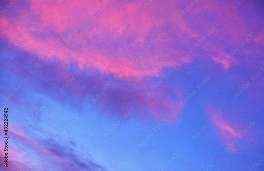pink clouds against blue sky in the early morning