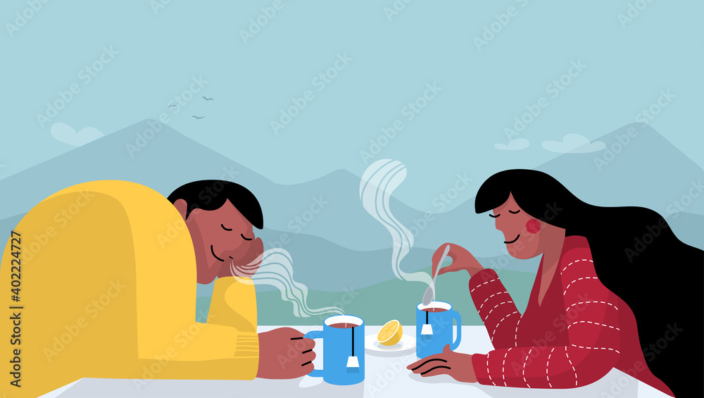 Couple drinking tea on terrace in the nature with mountains landscape in the background. Couple drinking tea on terrace in the nature with mountains landscape in the background.