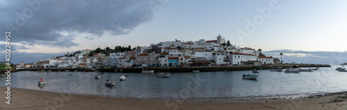 view of the quaint fishing village of Ferragudo on the Algarve coast of Portugal