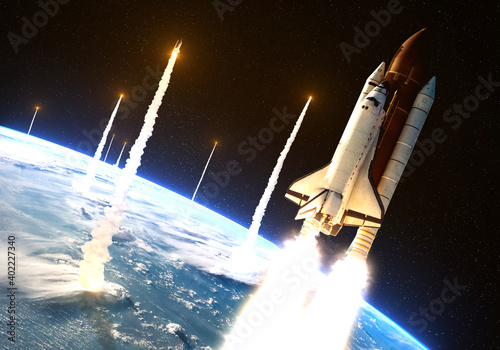 Fototapeta Naklejka Na Ścianę i Meble -  Multiple rockets launch from the Earth planet with atmosphere glow going to strange stars in the Universe. Science fiction illustration. Elements of this image furnished by NASA
