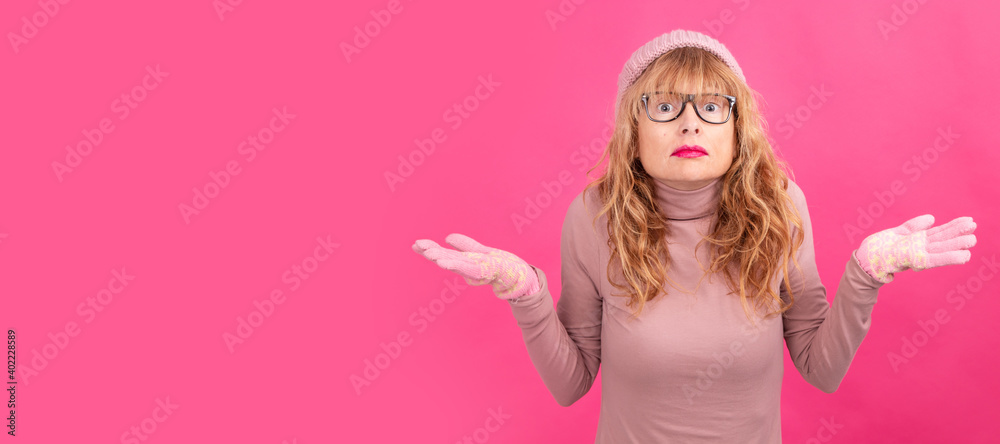 portrait of adult woman with expression of doubt or misunderstanding portrait of adult woman with expression of doubt or misunderstanding