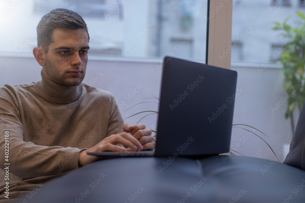 man working at home with laptop man working at home with laptop