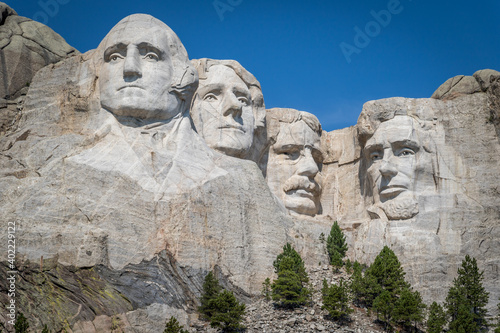 The Carved Busts of George Washington, Thomas Jefferson, Theodore “Teddy” Roosevelt, and Abraham Lincoln at Mount Rushmore National Monument photo