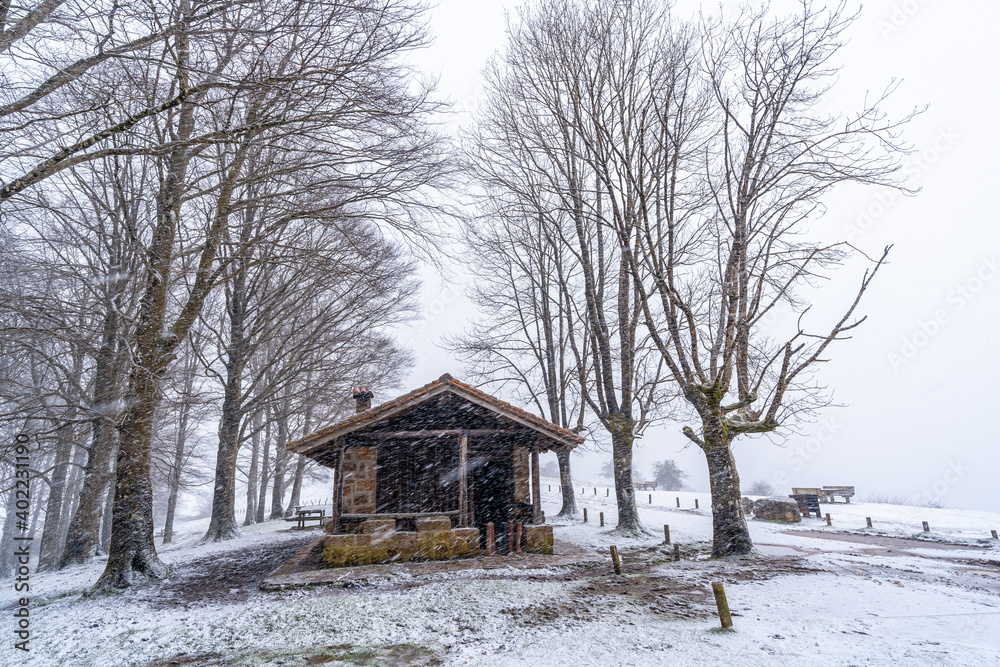 Beautiful refuge of the aizkorri mountain in gipuzkoa. Snowy landscape by winter snows. Basque Country, Spain Beautiful refuge of the aizkorri mountain in gipuzkoa. Snowy landscape by winter snows. Basque Country, Spain