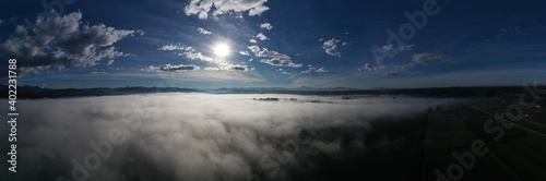 Obraz na płótnie Fog starting to clear up, aerial above farmland w salonie
