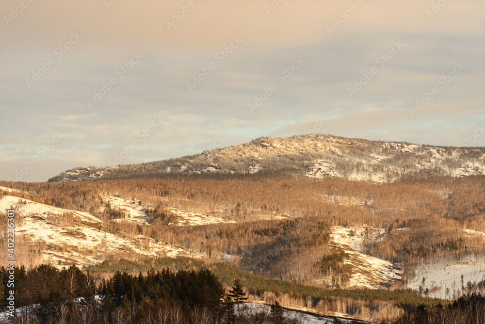 Mountains and forests in the Urals. Endless expanses of winter mountains.
