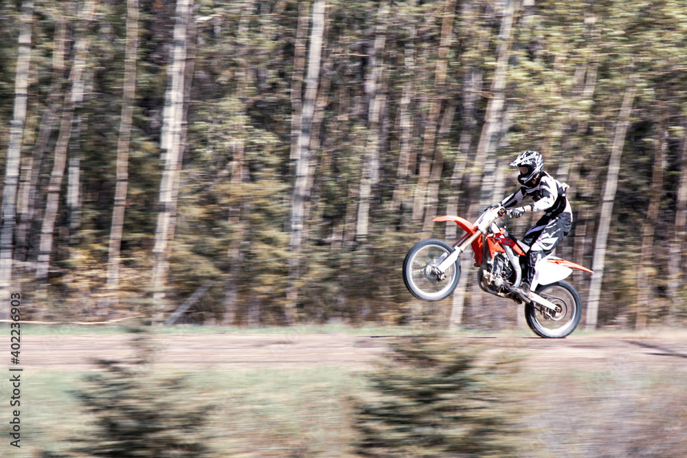 Wheelie dirt bike rider one wheel high speed motorbike Wheelie dirt bike rider one wheel high speed motorbike