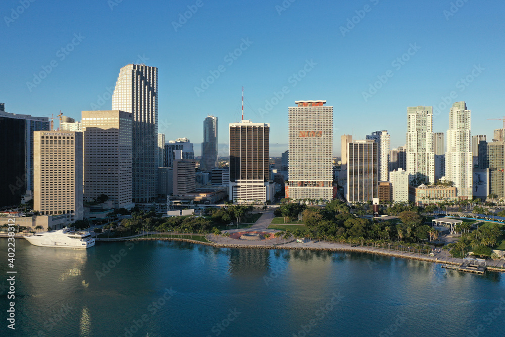 Fototapeta premium Miami, Florida - December 27, 2020 - Aerial view of City of Miami and Bayfront Park on sunny autumn morning.