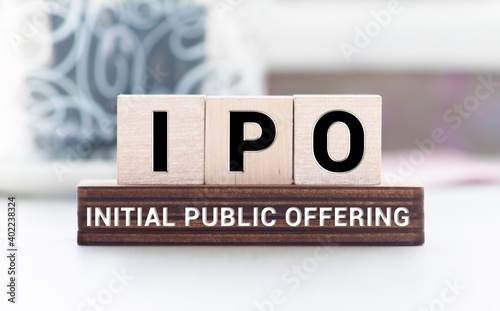 IPO - acronym from wooden blocks with letters, Initial Public Offering IPO concept, photo