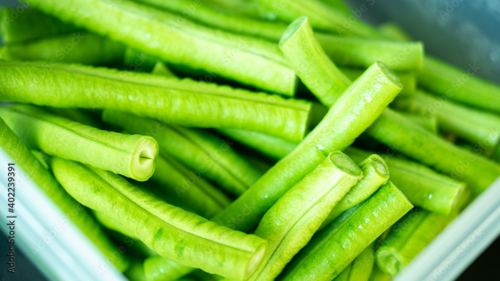 Organic green Yardlong beans in close-up shot. Organic green Yardlong beans in close-up shot.