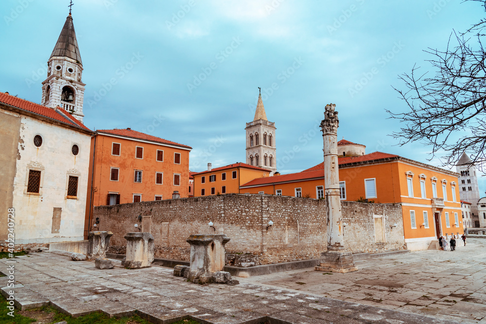 Pillar of Shame and Saint Elias church in the center of Zadar town, Croatia.