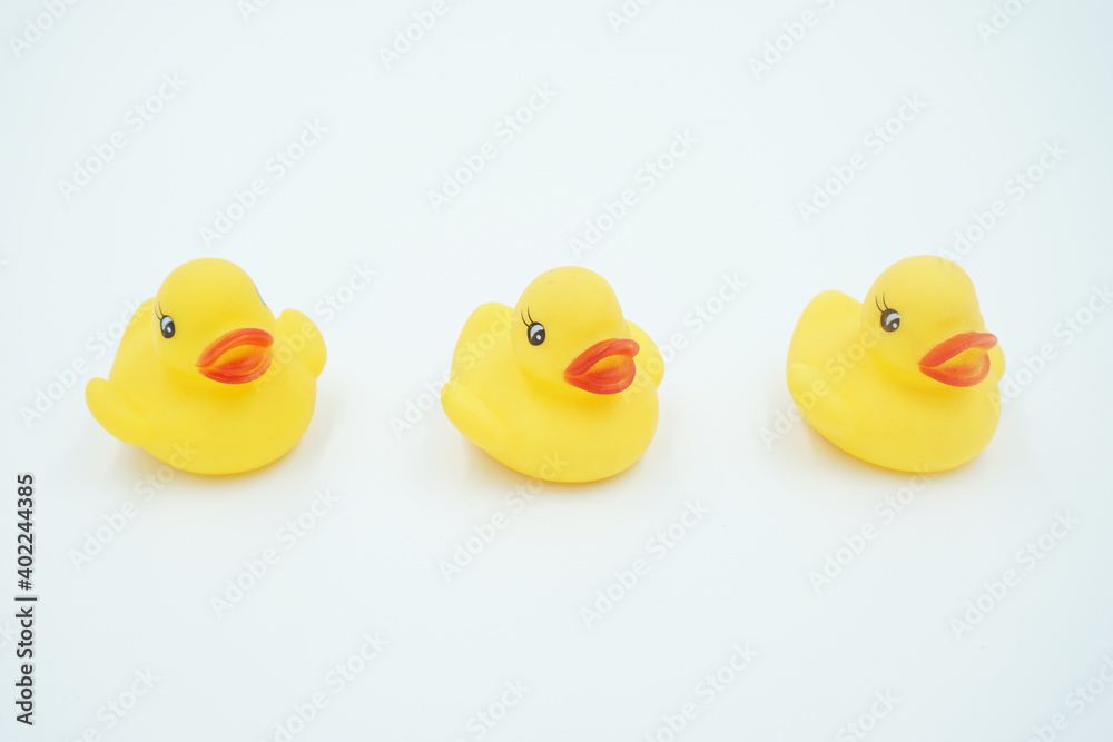 Three yellow ducklings on a white background Three yellow ducklings on a white background