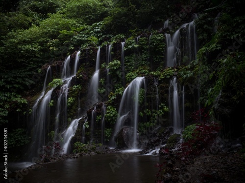 Long exposure of Banyu Wana Amertha Amerta waterfall air terjun in Wanagiri Buleleng northern Bali Indonesia photo