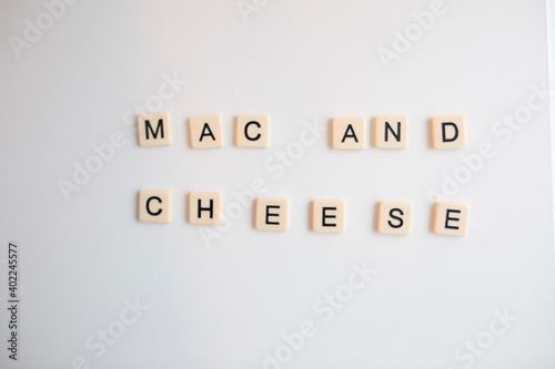 flat lay scrabble tiles spelling out mac and cheese