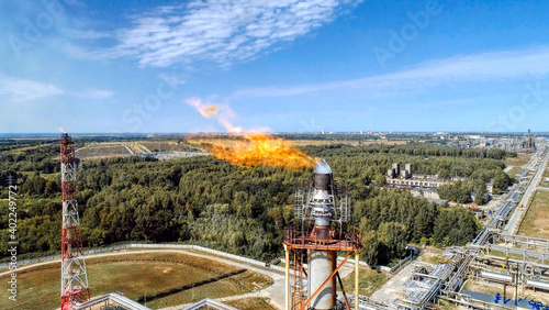 A burner for burning associated gas at a petrochemical plant.