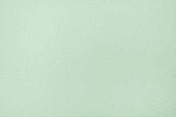 Green pastel color paper texture background or cardboard surface from a paper box for packing. and for the designs decoration and pattern abstract  concept