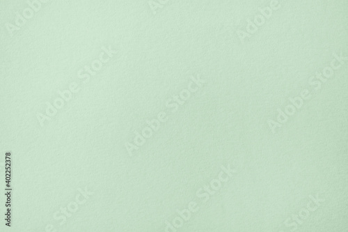 Green pastel color paper texture background or cardboard surface from a paper box for packing. and for the designs decoration and pattern abstract  concept