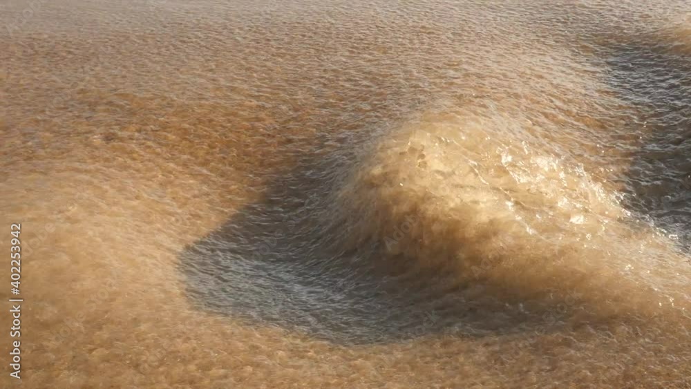 A fast and heavy streaming water in the canal. A fast and heavy streaming water in the canal.