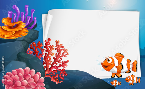Blank paper banner with clown fish and undersea nature elements on the underw...