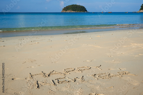 Happy new year letter on the beach © Teeradej