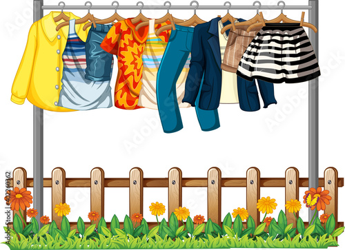 Clothes hanging on a clothesline with fence and flower elements on white background