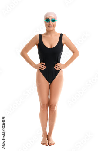 Female swimmer on white bac...