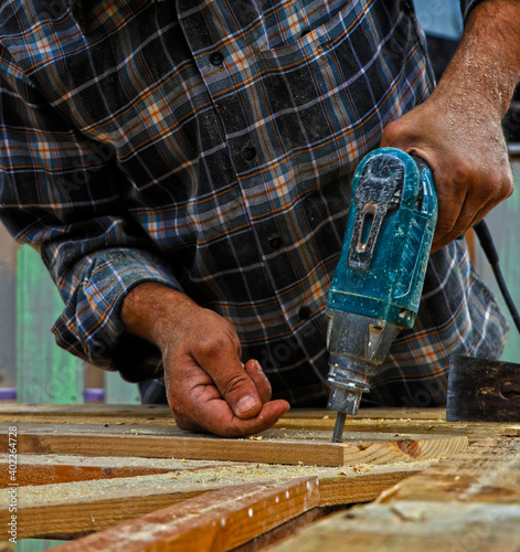 carpenter cutting wood