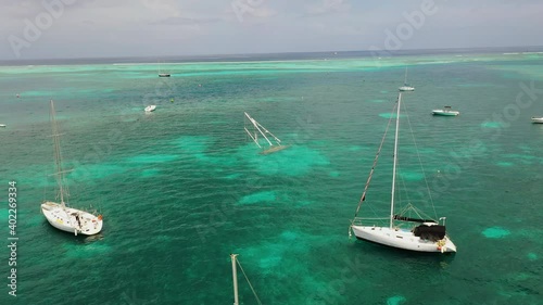 Aerial view of shipwrecked sailboat in St Croix Virgin Islands USVI harbor shot with drone