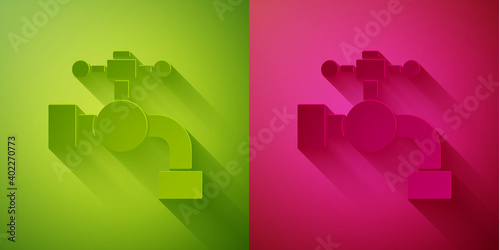 Paper cut Water tap icon isolated on green and pink background. Paper art style. Vector Illustration.