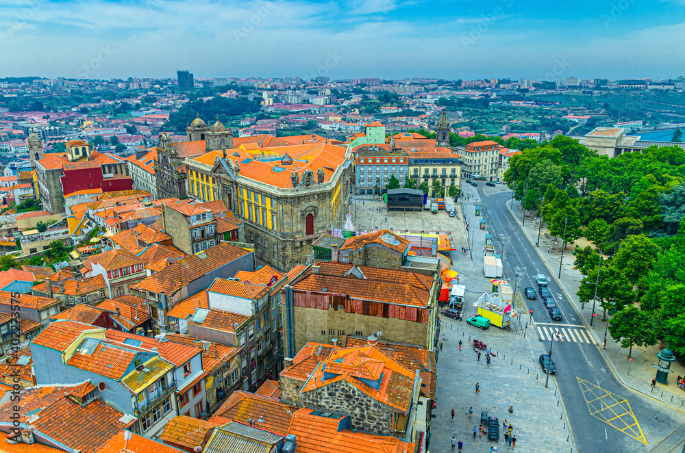 Aerial view of Porto Oporto city historical centre with red tiled roof typical buildings, Igreja de Sao Bento da Vitoria church, Cordoaria Garden and Vila Nova de Gaia city, Northern Portugal