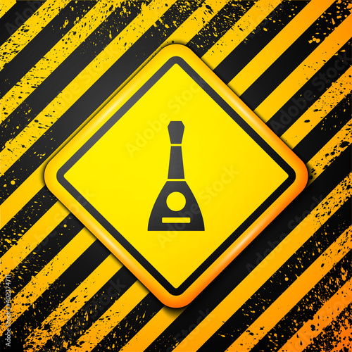 Black Musical instrument balalaika icon isolated on yellow background. Warning sign. Vector.